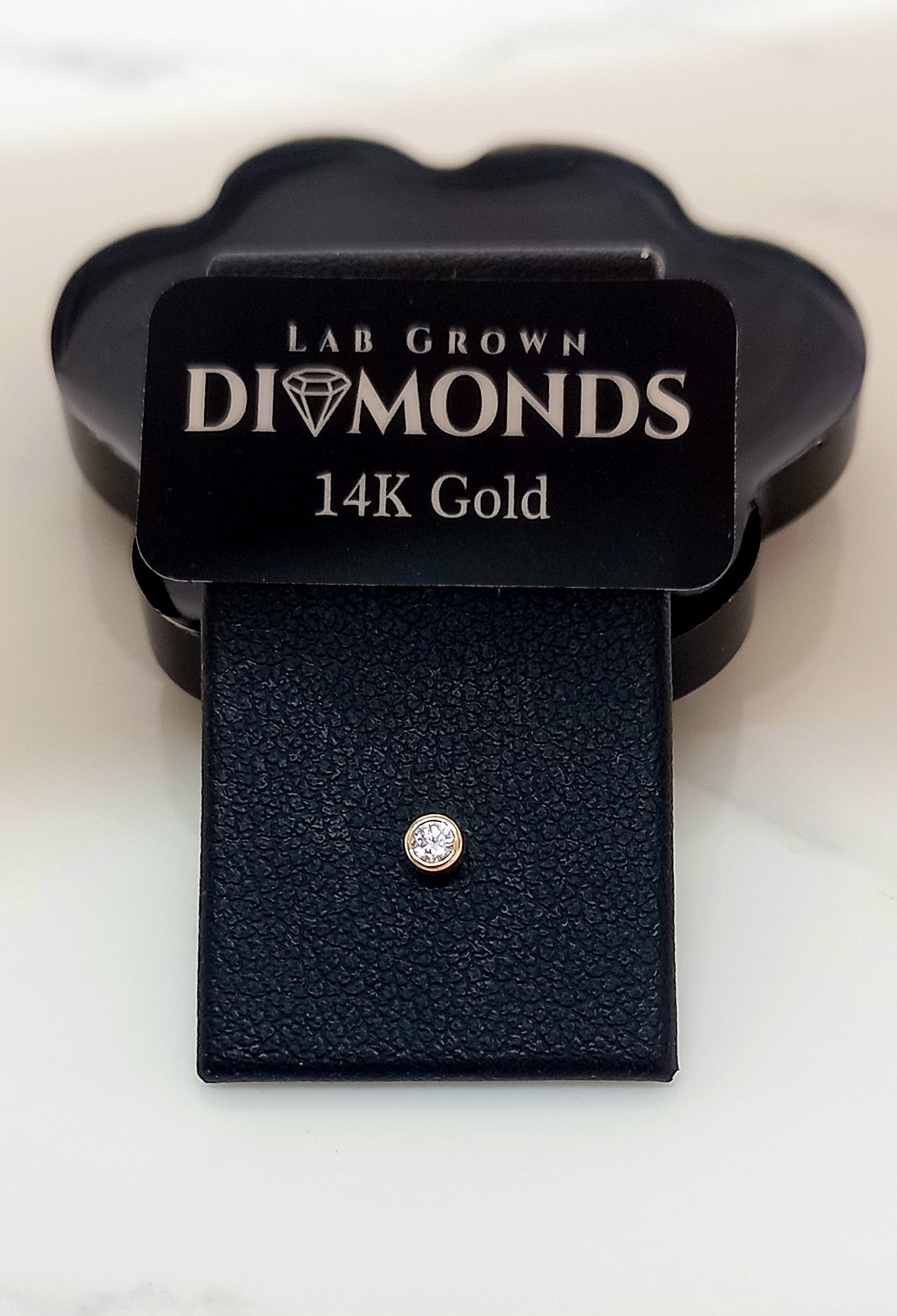 Oro 14k. Diamante 2mm